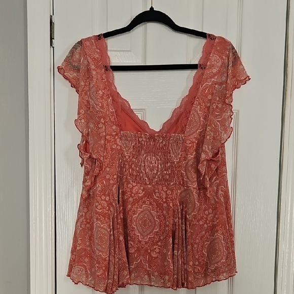 Torrid Pink Flutter Sleeve Smocked Peplum Top - Picture 8 of 12